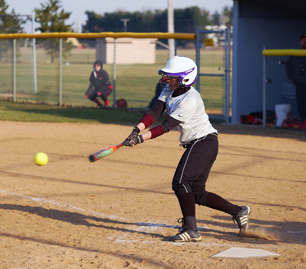 nafzigersoftball-web-pr2 Danae Nafziger takes a swing against Grace College in a recent softball game. Photo by Jordan Gleason/Goshen College Public Relations.