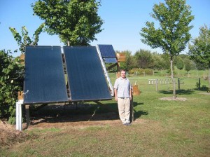 solar-panels-web-steve-shantz Steve Shantz with a residential solar panel array. Photo contributed by Steve Shantz.