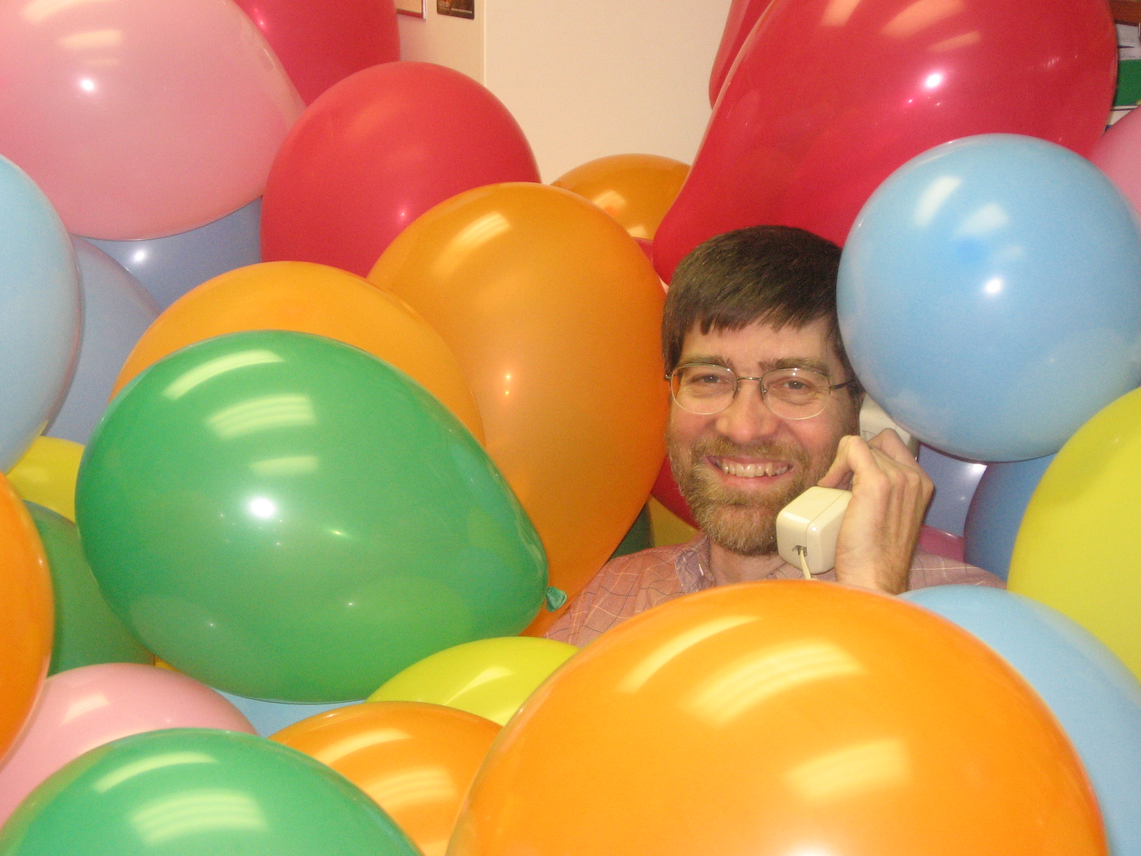 img_5283 John Ross Buschert found his office flooded with balloons on Tuesday, March 31. The prank was in response to a quiz question assigned by Buschert. Photo by Chase Snyder.