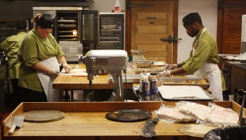 In the kitchen. Two chefs work in the kitchen of the recently renovated Westlawn Dining Hall. Photo by Tim Blaum