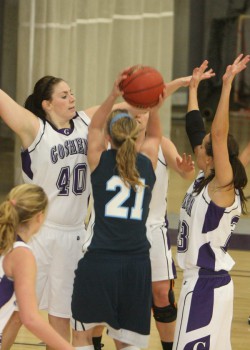 Womens_BB-Martin Cassie Grieves (left) blocks out an opponent in the Maple Leafs' recent contest against Trinity. Photo by Martin Brubaker.