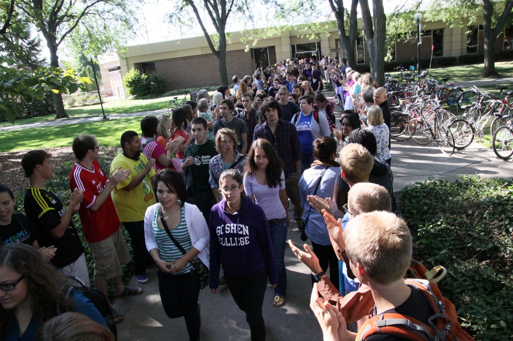 Students walk through the traditional "welcome tunnel" at last fall's convocation. Photo by Isaac Fast