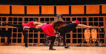 Lyrical Hip-Hop club members Stefan Baumgartner, senior, and juniors Olivia Ginn and Jose Mendoza perform a routine during Kick Off.