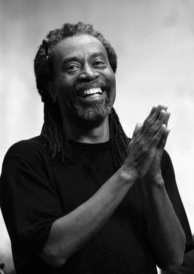 Photo of Bobby McFerrin laughing and clapping