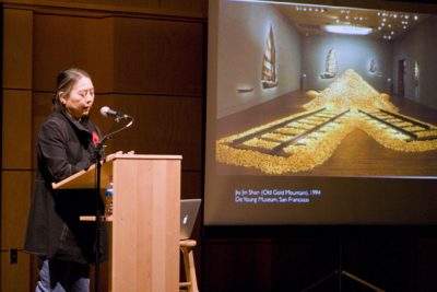 Hung Liu shows a slide of her piece "Old Gold Mountain" in Umble Center during her guest lecture