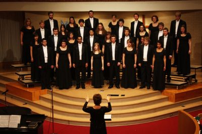 Deb Brubaker conducts Chamber Choir during a concert