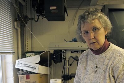 Judy Wenig-Horswell lays out beads and other materials for her jewelry class