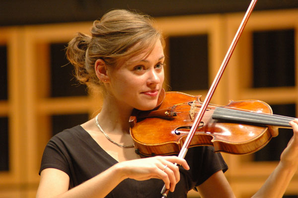 Leslee Smucker plays the violin during a concert in Sauder Concert Hall