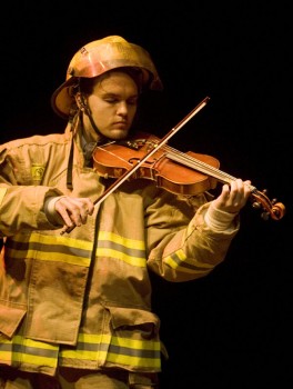 Josh Hofer plays a quiet yet comical firefighter in the second one act, The Still Alarm. Photo by Emily Miller.