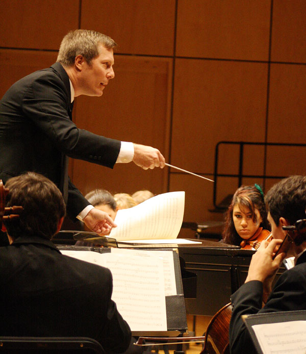 Gregg Thaller conducts the Goshen College orchestra on the Sauder Concert Hall stage