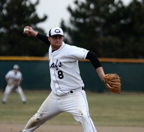 Baseball player pitching