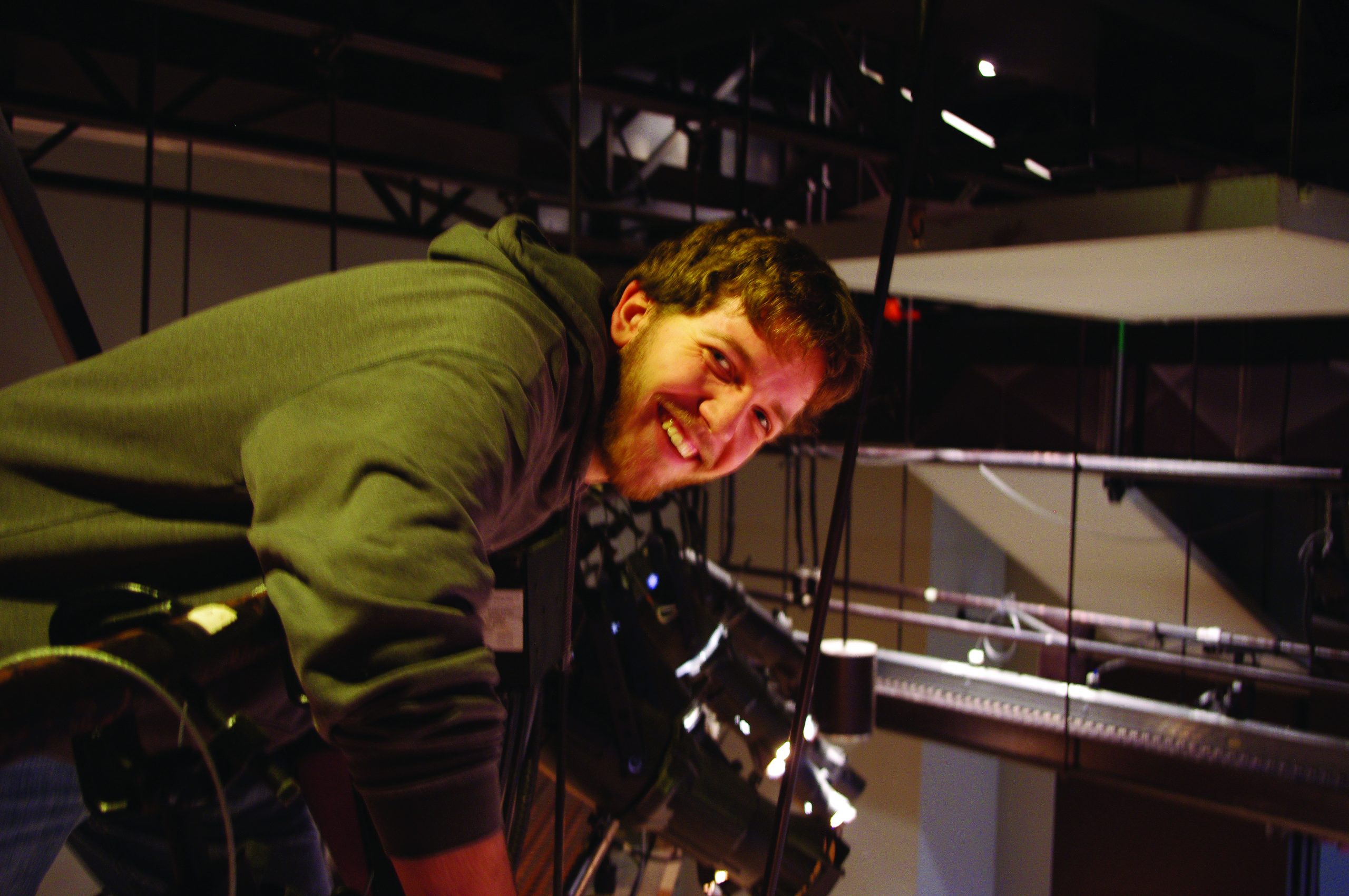 Matt Lehman controls the lighting for a "War of the Worlds" theatre production