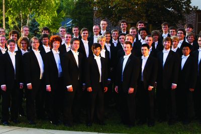 The Goshen Men's Choir poses for a picture
