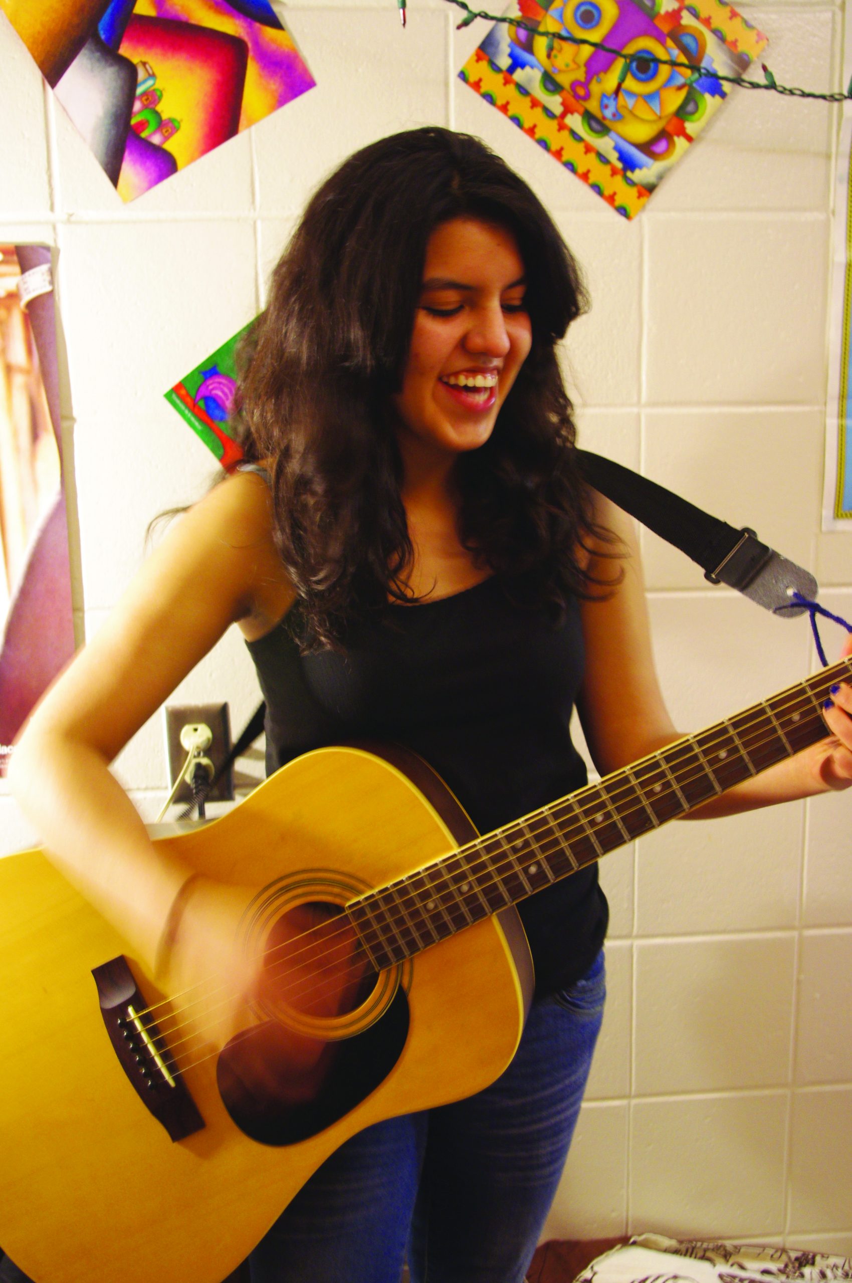 Andrea Moya with guitar