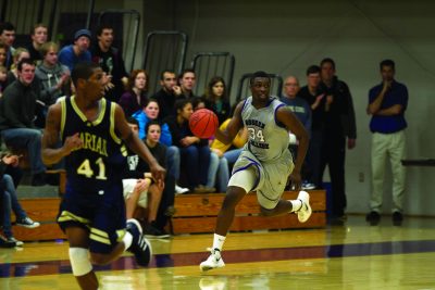 basketball player breaks down court