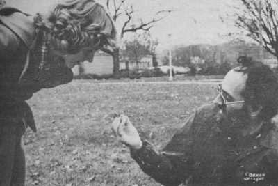 Steven Johns shows a four-leaf clover to Tina Yoder in 1979