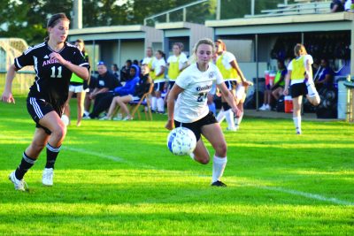 women's soccer player in action