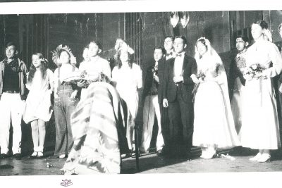 Students pose in costume for a mock wedding at a 1930 Goshen College Halloween costume party