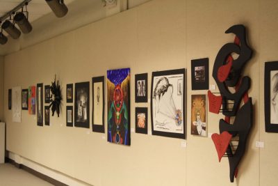 Students' "Lion and Lamb" artwork hangs in the Good Library Gallery
