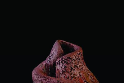 Image of one of Abi Abebe Tsigie's vase-like, brown and black ceramic structures