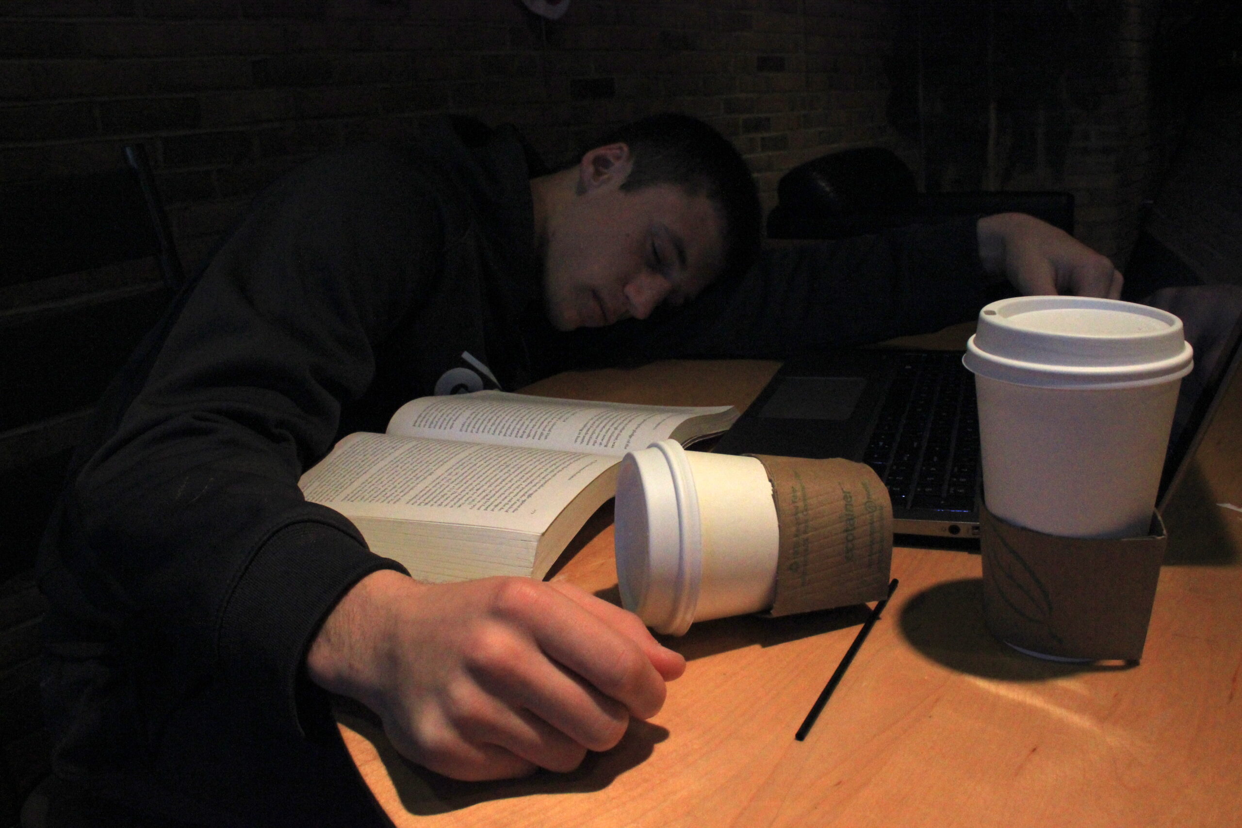 student sleeps on their desk