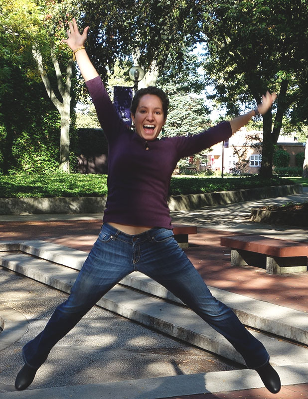 Photo of Maria Jantz mid-jump in Schrock Plaza
