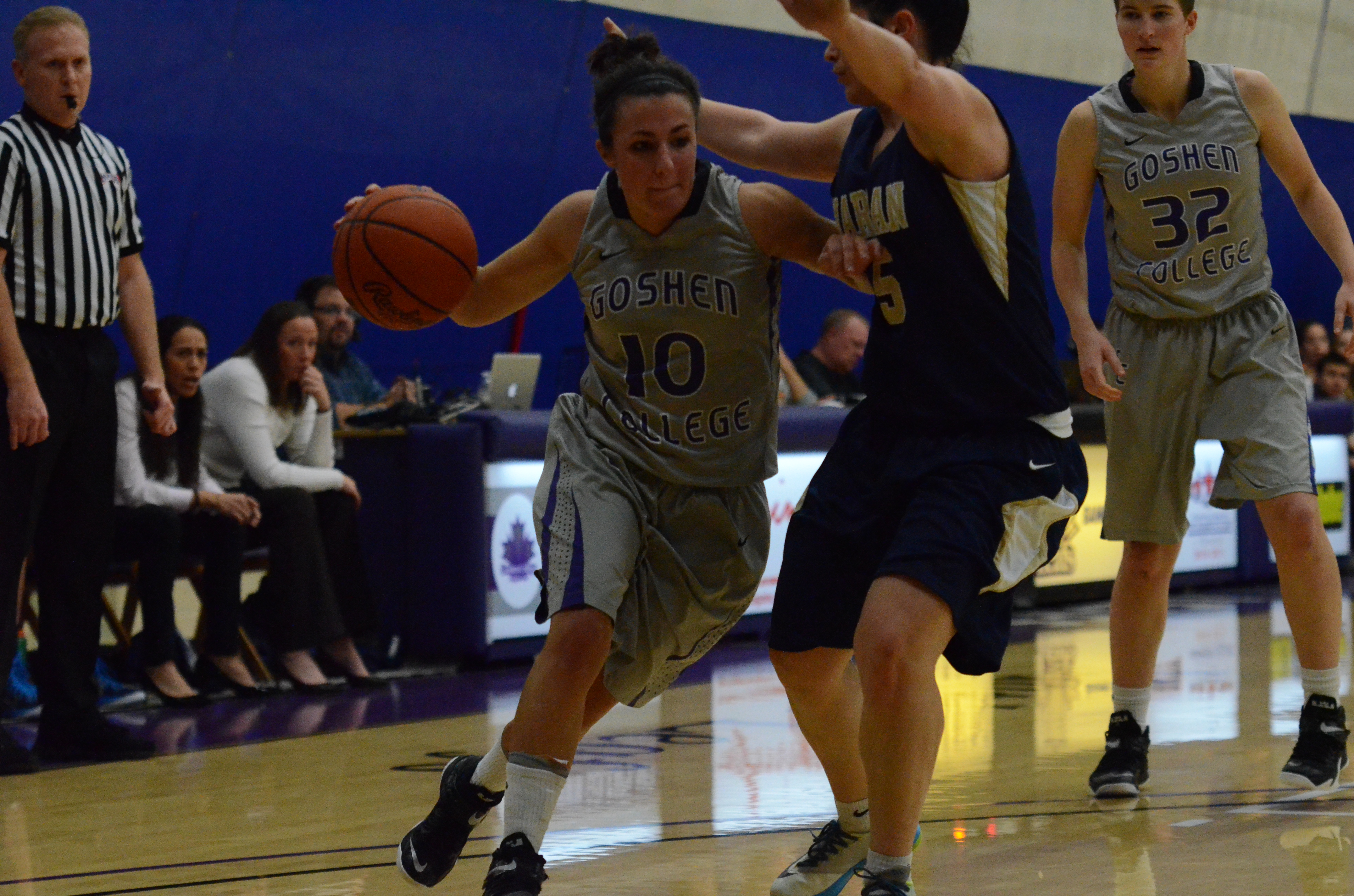 Avery Bishoff dribbles the ball around an opposing player during a game