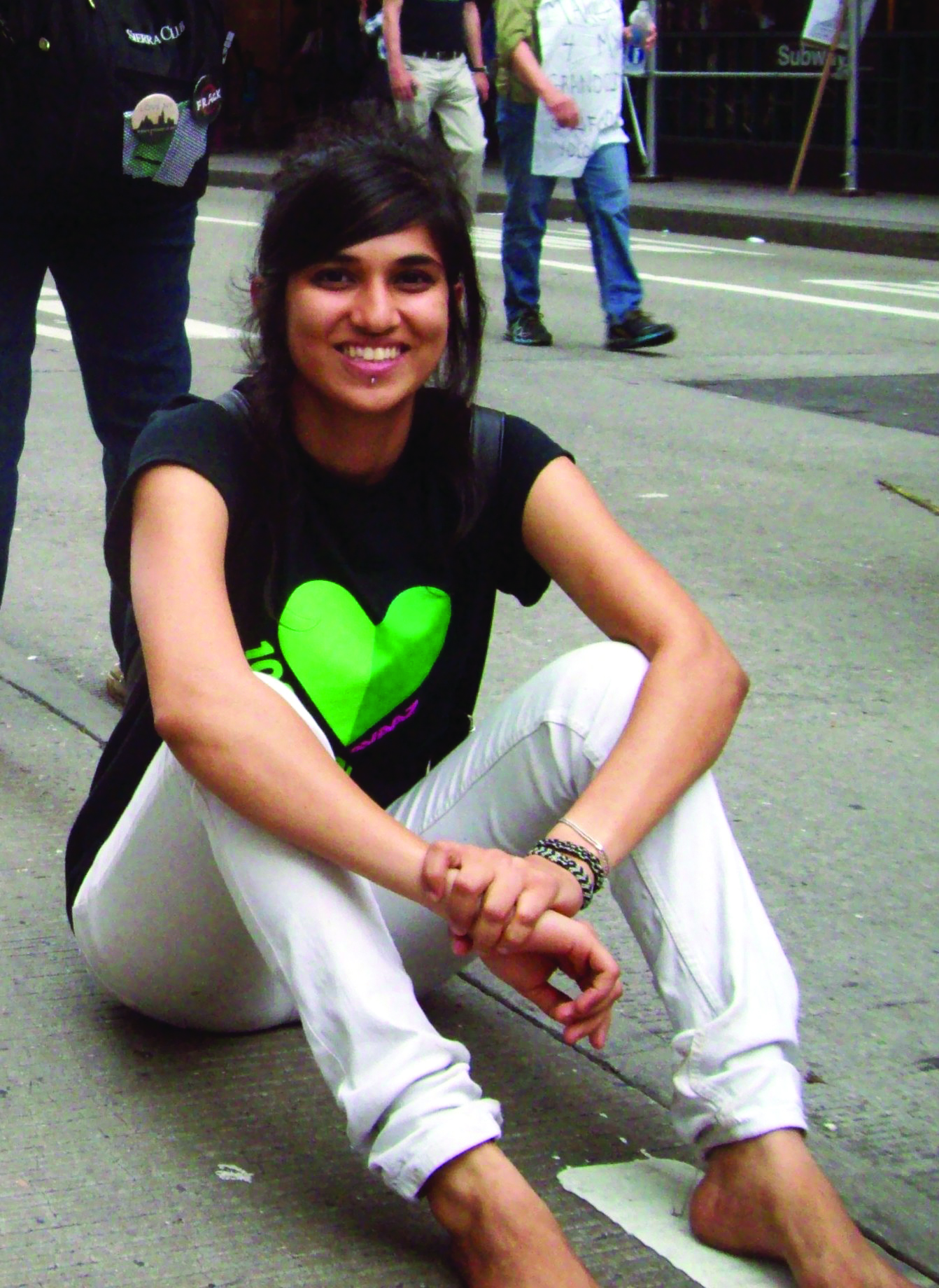 Deeksha Pagar sitting on a street