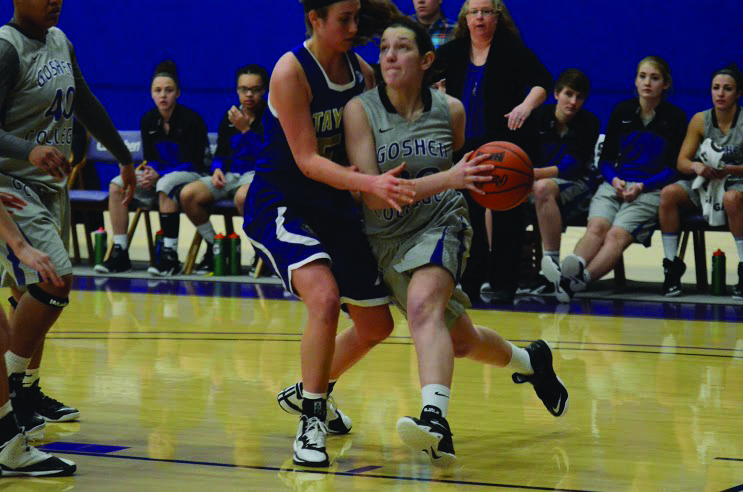 Jamie Stack avoids an opposing player as she prepares to take a shot