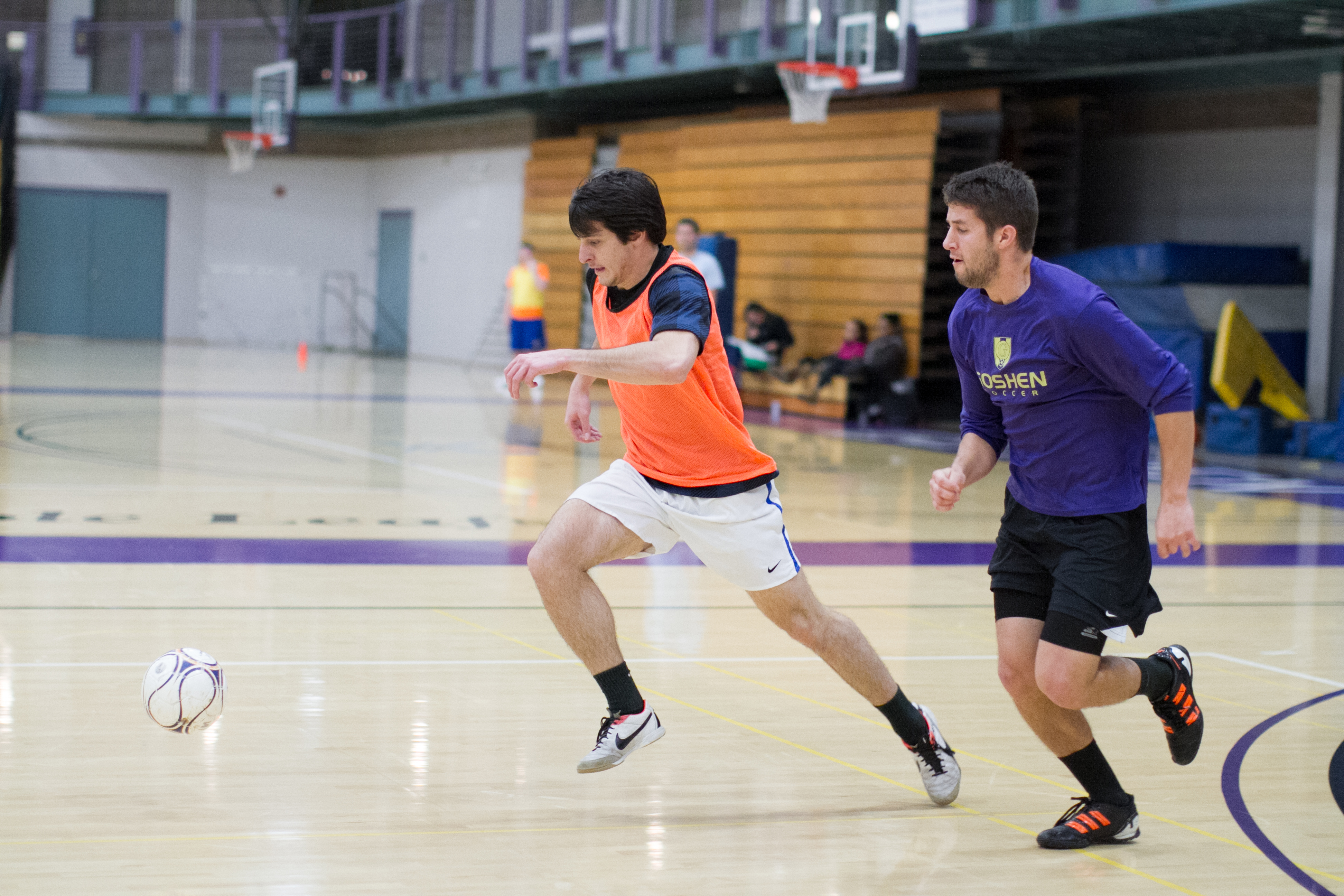 Two students play a game of intramural soccer in the RFC