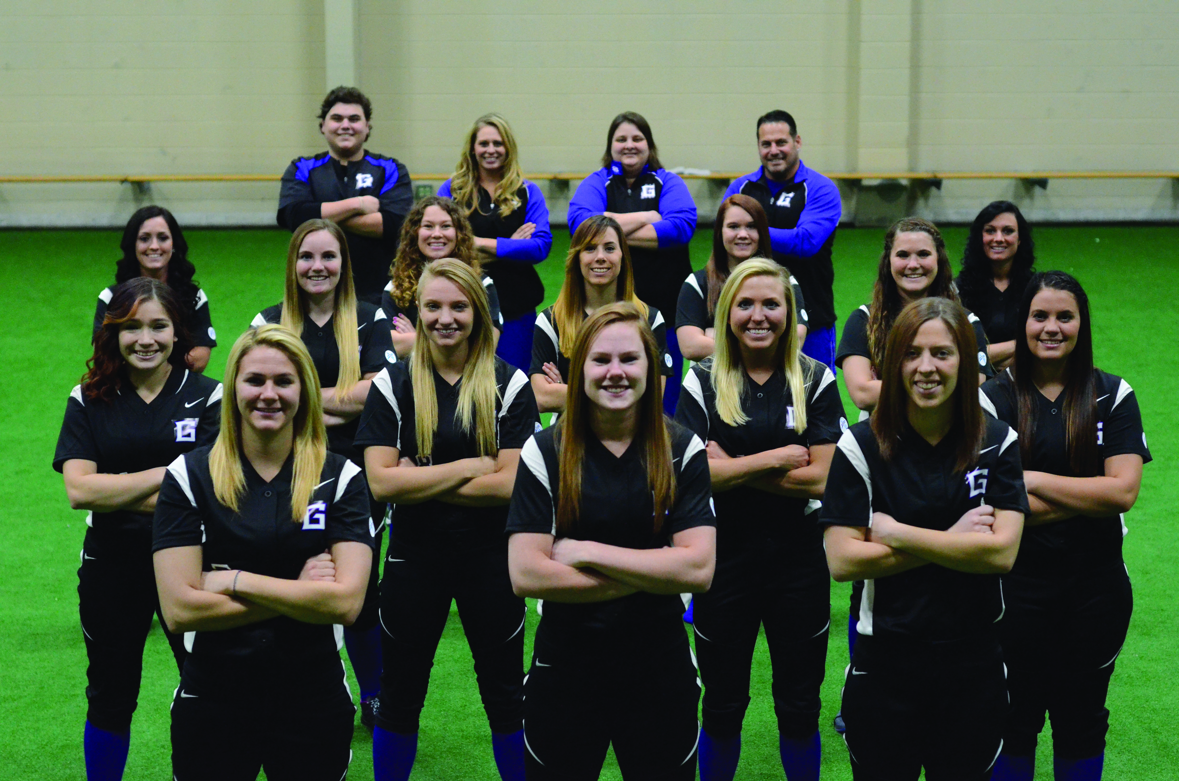 The 2014-2015 women's softball team poses for a picture