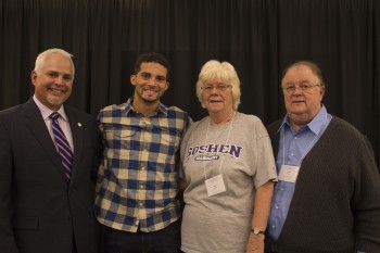 Trever Emery, a senior, with his grandparents, Mary and Robert Emery and President James Brenneman. Photo by Hannah Sauder.