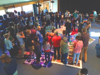 GC students and community members experiencing the “Loss of Turtle Island” simulations on Tuesday. Photo by Claire Mitchel.