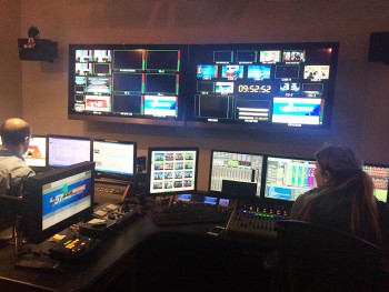 Above: Ashley Davenport obvserves in the control room during preparation for the 10:00 show. Below: Tyra Carver unloads inventory at Speedway. Top photo contributed by Ashley Davenport. Bottom photo contributed by Tyra Carver.