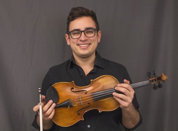 Jorge Abreu Toyens, a senior, will move to Barcelona in February to pursue a graduate degree in violin performance. Photo by Hannah Sauder.