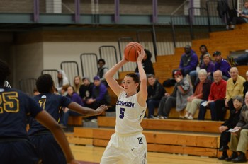 Liz Tecca, shown on the basketball court, discusses the wage inequality between men's and women's professional basketball. Photo by Maria Bischoff