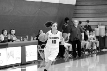 Haley Archibeque, freshman, brings the ball up the court for the Maple Leafs. Photo by Maria Bischoff