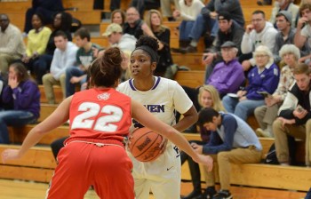 Lynnia Noel, junior, runs the offense for Goshen. On Wednesday night the women's basketball team was selected to play in the NAIA national tournament. Photo by Maria Bischoff