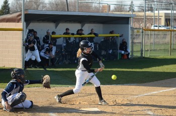 Krista Sutliff, junior, bats for the Maple Leafs against Spring Arbor University. Photo by Maria Bischoff