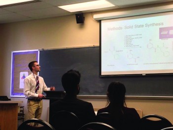 Jacob Roth, junior, presents on his organic synthesis research at the Academic Symposium. Photo by Maddy Garber