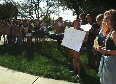 students rally with signs