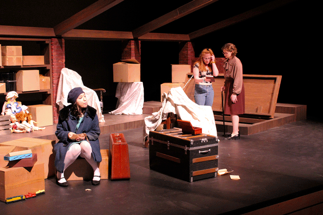 Three student actors rehearse "Kindertransport" onstage Umble Center