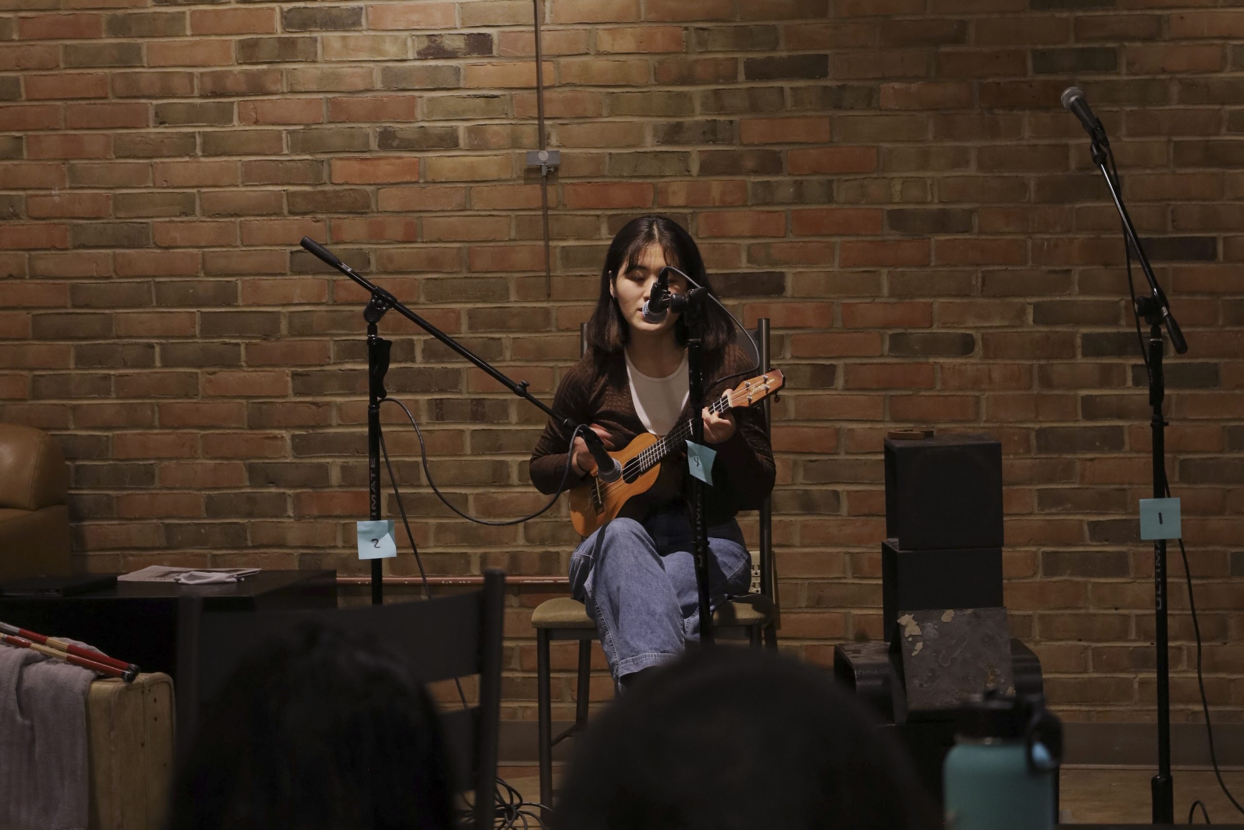 Yujin singing and playing ukulele
